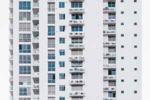 minimalist photography of white and gray condominium