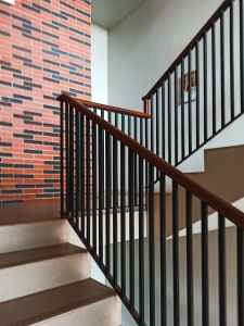 staircase with railing in modern apartment building